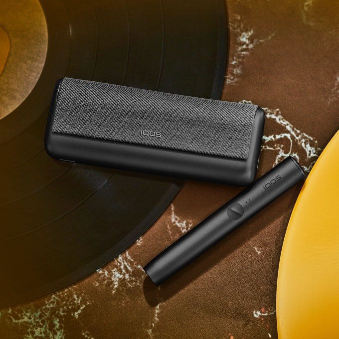 IQOS ILUMA PRIME Your first steps with IQOS ILUMA PRIME Follow this guide to learn all about your new IQOS ILUMA PRIME: How to use, maintain and charge your device to make the most of your experience. Get started with your new IQOS ILUMA PRIME with a few easy steps 1.Before first use, fully charge your device with AC Power Adapter* (sold separately) and Charging Cable for approximately 135 minutes. Tap the button on your IQOS ILUMA PRIME Pocket Charger to check your battery level. If the level is low then charge the pocket charger with a compatible AC power adapter* (sold separately) and cable. 2.By pressing the button at the top of your Pocket Charger for four seconds you can turn the device ON/OFF. Then check the status lights on your IQOS ILUMA PRIME Holder to see how many experiences you have. Two lights mean it’s fully charged (ready for two uses). One light means it’s ready for one use. No lights mean the Holder needs to be charged in the Pocket Charger. 3.Gently insert a SMARTCORE stick as seen in the video. The Autostart is activated upon insertion of the SMARTCORE stick. If the Autostart is disabled, you can press the button on the Holder to start the experience. One vibration and lights pulsing slowly means it’s heating up the SMARTCORE stick. Two vibrations and light(s) ON means it is ready for use. 4.When you feel another two vibrations, your IQOS time is nearly up (30 sec or 2 puffs remaining). Simply remove the SMARTCORE stick and remember to use a new stick for your next experience. Remember that one light means you only have one experience left, so you'll need to charge the Holder in the Pocket Charger after your next experience. 5.When your Holder is in the Pocket Charger there are two round lights that indicate the status of the Holder. When the round lights are pulsing white, this means the Holder is getting charged. One or two solid round lights on the Pocket Charger indicates how many experiences you have readily available. *Disclaimer: The AC Power Adapter is not included. Do use the IQOS Power Adapter from your previous IQOS device or purchase it separately at iqos.com or IQOS stores. See FAQ for more information. Get ready to experience next level tobacco with IQOS ILUMA PRIME, our most refined and advanced device yet. With SMARTCORE INDUCTION SYSTEM™ technology at its core, it delivers a clean and effortless experience. Because it heats from the inside out - IQOS ILUMA PRIME makes the perfect choice.