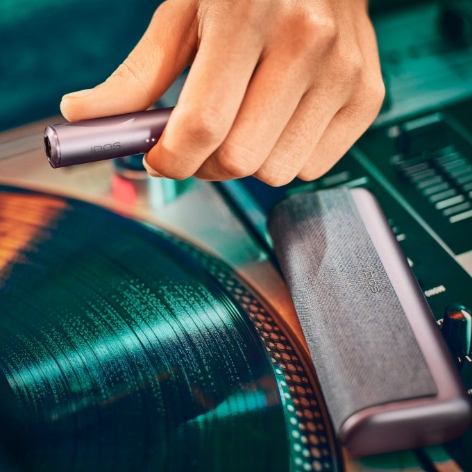 IQOS ILUMA PRIME Your first steps with IQOS ILUMA PRIME Follow this guide to learn all about your new IQOS ILUMA PRIME: How to use, maintain and charge your device to make the most of your experience. Get started with your new IQOS ILUMA PRIME with a few easy steps 1.Before first use, fully charge your device with AC Power Adapter* (sold separately) and Charging Cable for approximately 135 minutes. Tap the button on your IQOS ILUMA PRIME Pocket Charger to check your battery level. If the level is low then charge the pocket charger with a compatible AC power adapter* (sold separately) and cable. 2.By pressing the button at the top of your Pocket Charger for four seconds you can turn the device ON/OFF. Then check the status lights on your IQOS ILUMA PRIME Holder to see how many experiences you have. Two lights mean it’s fully charged (ready for two uses). One light means it’s ready for one use. No lights mean the Holder needs to be charged in the Pocket Charger. 3.Gently insert a SMARTCORE stick as seen in the video. The Autostart is activated upon insertion of the SMARTCORE stick. If the Autostart is disabled, you can press the button on the Holder to start the experience. One vibration and lights pulsing slowly means it’s heating up the SMARTCORE stick. Two vibrations and light(s) ON means it is ready for use. 4.When you feel another two vibrations, your IQOS time is nearly up (30 sec or 2 puffs remaining). Simply remove the SMARTCORE stick and remember to use a new stick for your next experience. Remember that one light means you only have one experience left, so you'll need to charge the Holder in the Pocket Charger after your next experience. 5.When your Holder is in the Pocket Charger there are two round lights that indicate the status of the Holder. When the round lights are pulsing white, this means the Holder is getting charged. One or two solid round lights on the Pocket Charger indicates how many experiences you have readily available. *Disclaimer: The AC Power Adapter is not included. Do use the IQOS Power Adapter from your previous IQOS device or purchase it separately at iqos.com or IQOS stores. See FAQ for more information. Get ready to experience next level tobacco with IQOS ILUMA PRIME, our most refined and advanced device yet. With SMARTCORE INDUCTION SYSTEM™ technology at its core, it delivers a clean and effortless experience. Because it heats from the inside out - IQOS ILUMA PRIME makes the perfect choice.